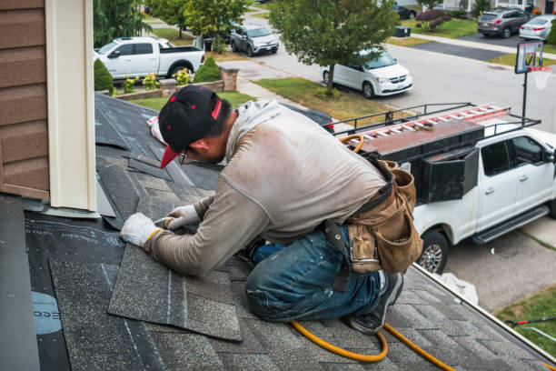 Professional Storm Damage Roof Repair technician working in Moulton, TX